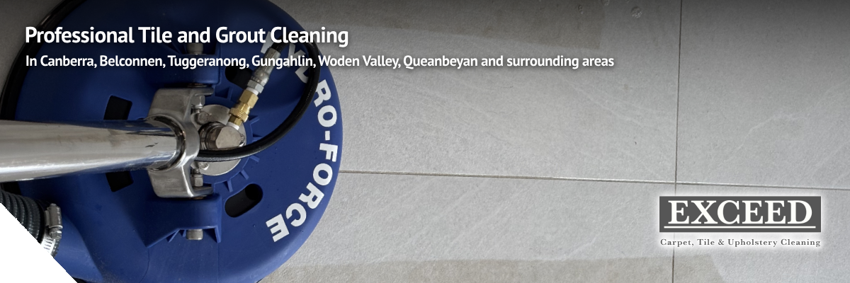 Professional tile and grout cleaning equipment in action, featuring a blue cleaning machine on tiled floor, with text highlighting services in Canberra and surrounding areas by Exceed Carpet Cleaning.